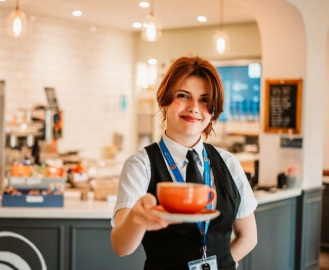 Ana serving coffee in Edspresso