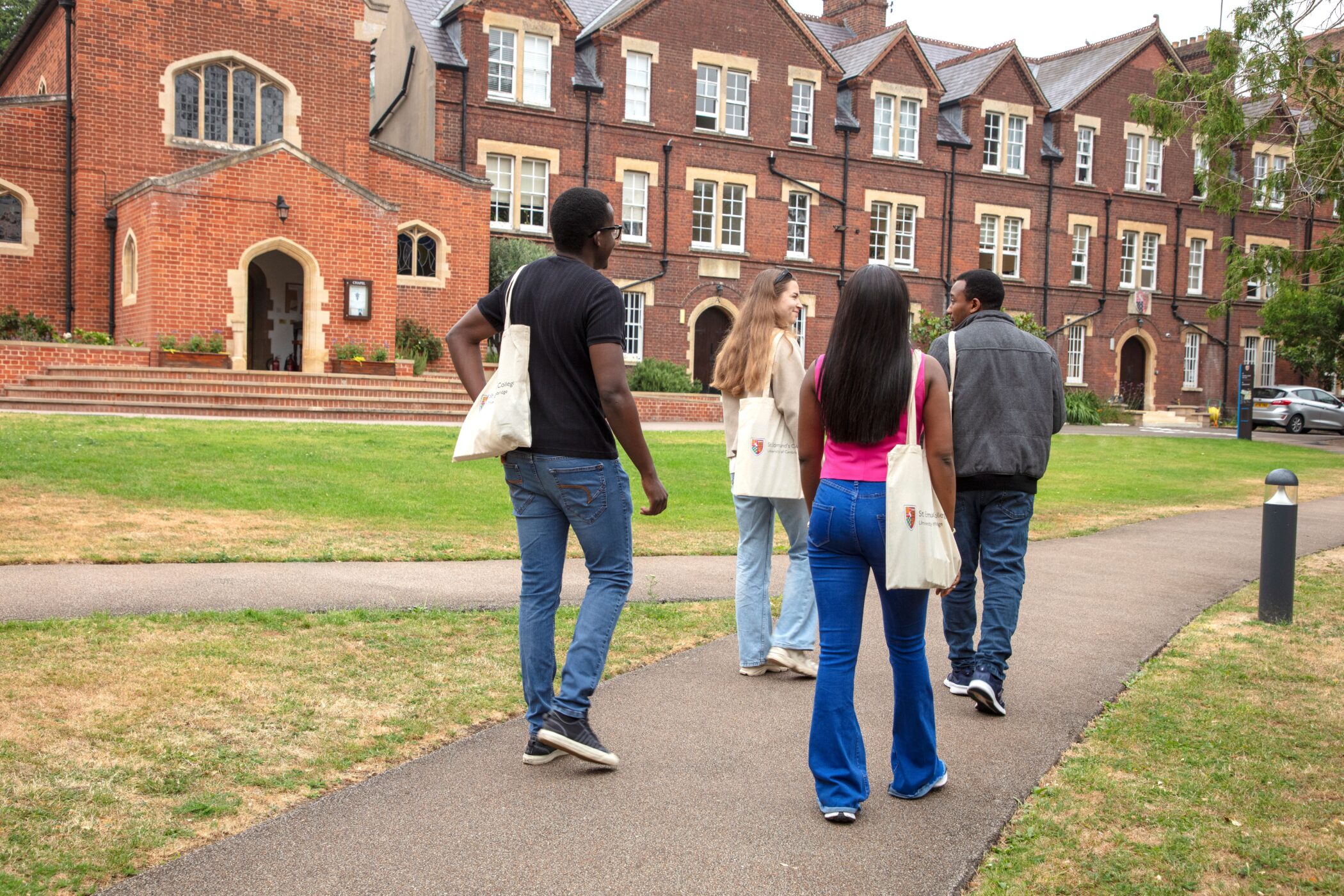 Students walking by Norfolk Building. Image by Elayne Barre