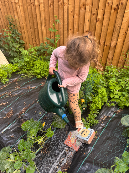 Child in veg patch. Credit: Nicole Brooks